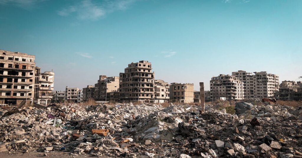 View of demolished buildings and rubble in Homs, Syria post-conflict.