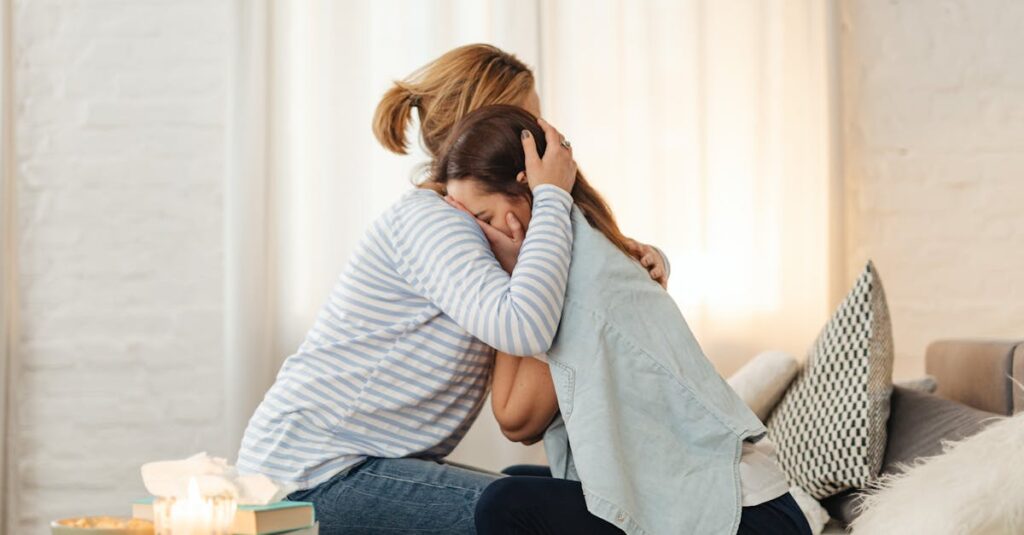 Heartfelt moment of a mother comforting her daughter with a warm hug indoors.